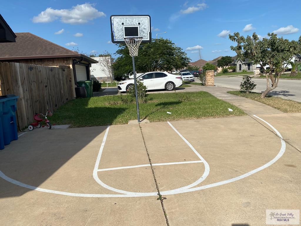 Basket ball court set up at driveway.